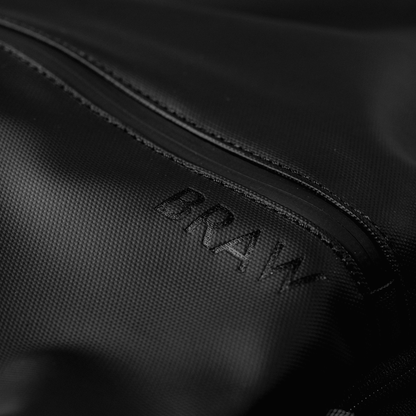 Close-up of the embossed BRAW logo on the black Explorer 2