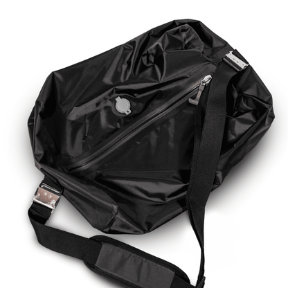 Removable BRAW ClipPod compression bag lifted out of the Explorer 2 main compartment